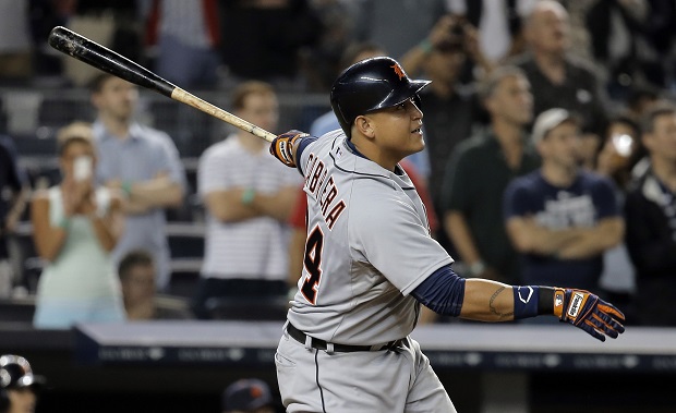 Detroit Tigers batter Miguel Cabrera watches the ball as he hits a two-run, two-strike, two-out, home run to tie the game in New York