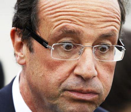 Presidente Hollande con gesto de absoluta sorpresa