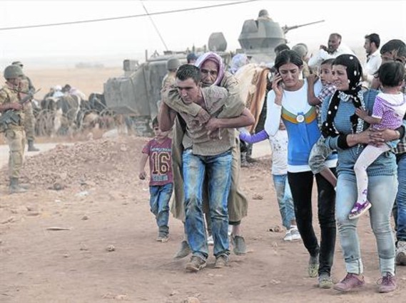 Refugiados Sirios huyen hacia Turquía