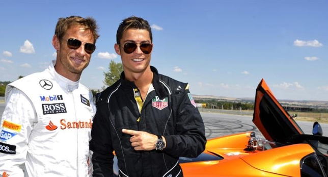 Cristiano Ronaldo con el corredor de fórmula Jenson Button